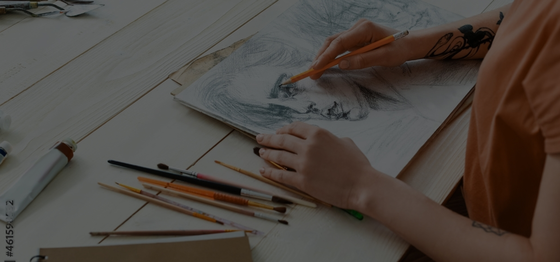A student sketching a pencil portrait — the craft of drawing at Art Lines Academy.